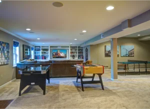 Rendon Remodeling finished basement with home gym and entertainment area